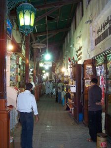 Market vendors selling their wares at the souks of Dubai is an amazing place to visit on 48 hours to Dubai.
