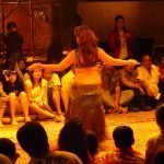 Belly dancer performing for the tourists on a desert safari in Dubai.