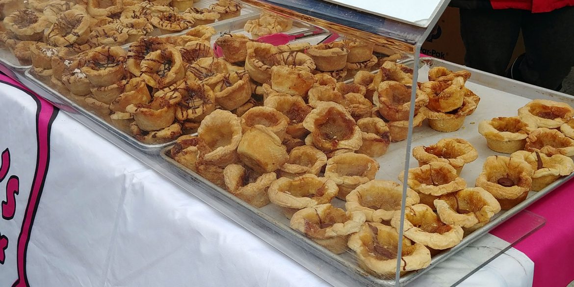 Carla's Cookie Box butter tart quest display at the Elmira Maple Syrup Festival - a favourite annual day trip for Roguetrippers.