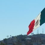 Roguetrippers enjoy a day trip to Mexico. Giant Mexican Flag blowing in the wind can be seen for quite a distance, welcoming visitors.