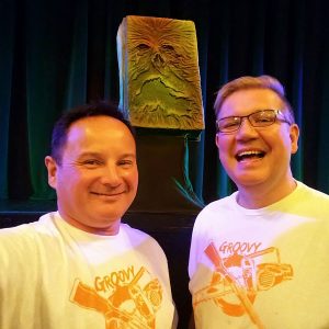 Greg and Nick posing with the Necronomicon.