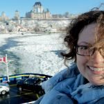 roguetrippers take the ferry to Quebec City with Chateau Frontenac in the distance