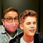 Nick Kulnies poses with his best friend Justin Bieber Sind a duet on the steps of Avon Theatre