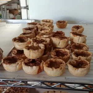 Roguetrippers enjoy the butter tarts at Impressions bakery.