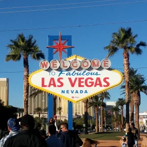 The Welcome to Vegas sign has a tourist queue that travellers follow